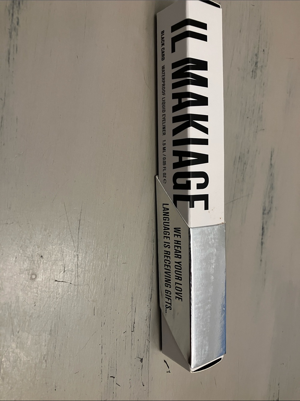 IL MAKIAGE Black Liquid Eyeliner in Black and Silver Packaging